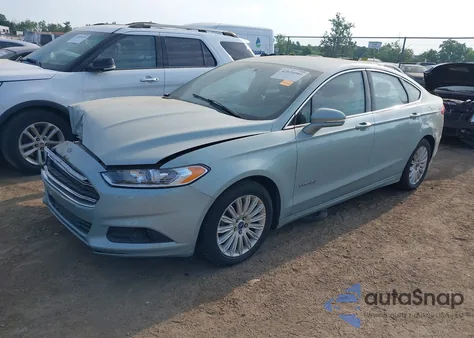 2013 Ford Fusion Hybrid Se z USA, uszkodzony, nr VIN 3FA6P0LUXDR240673